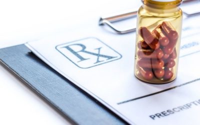 pills on prescription pad